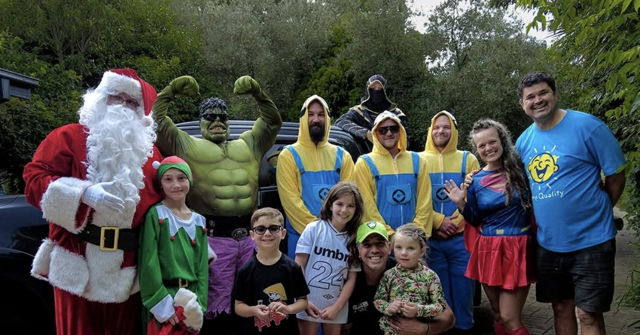 Pristine Pools Super Splash for Camp Quality group photo Pristine Pools team and community volunteers in costume at a Camp Quality fundraising event